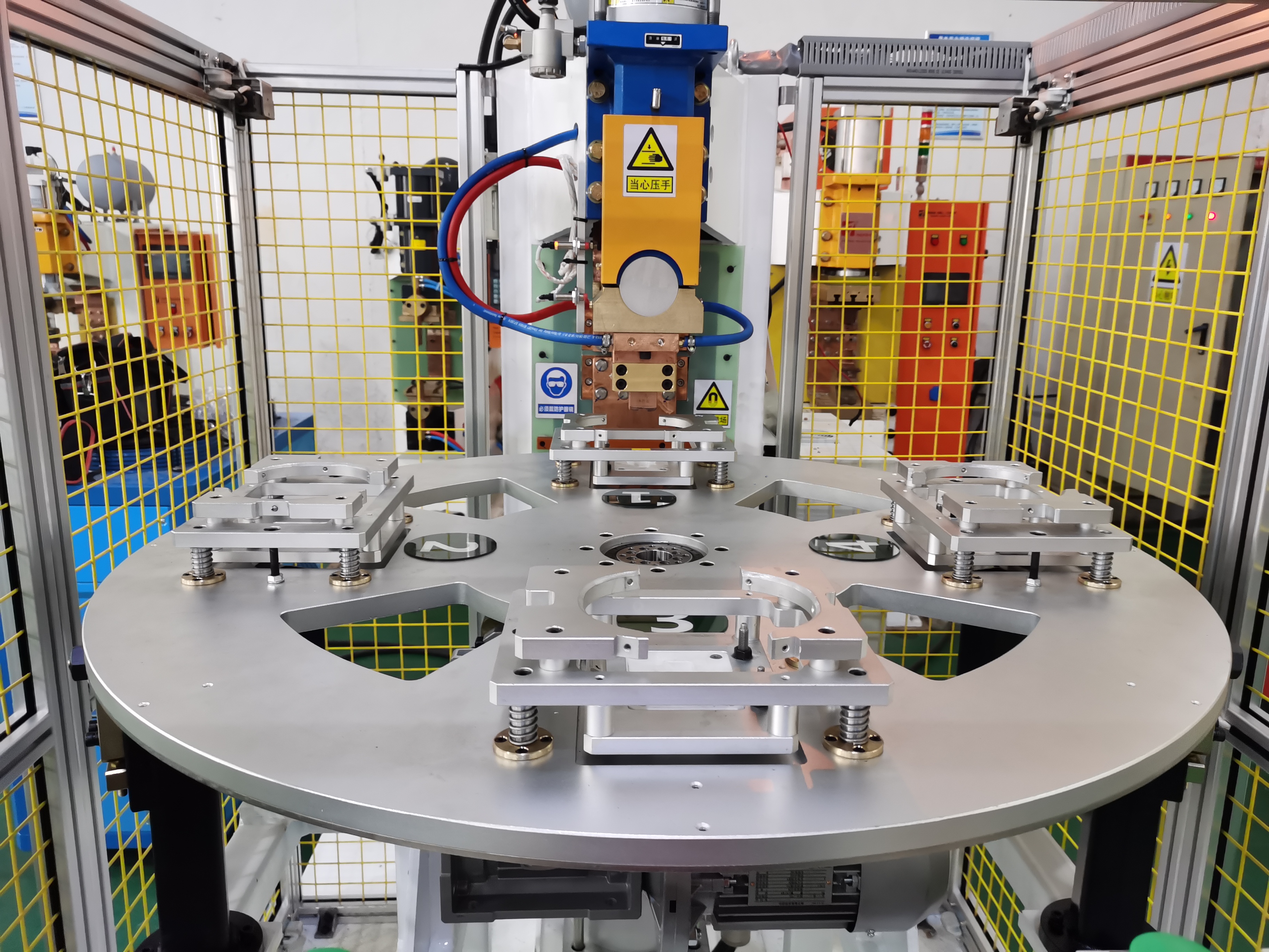 壓縮機殼體支架四工位凸焊機項目介紹 壓縮機殼體支架四工位凸焊機項目介紹